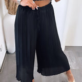 Maia - Crne plisirane pantalone