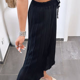 Maia - Crne plisirane pantalone