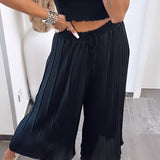 Maia - Crne plisirane pantalone