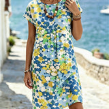 Vestido com Decote Redondo e Estampa Colorida