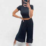 Maia - Crne plisirane pantalone