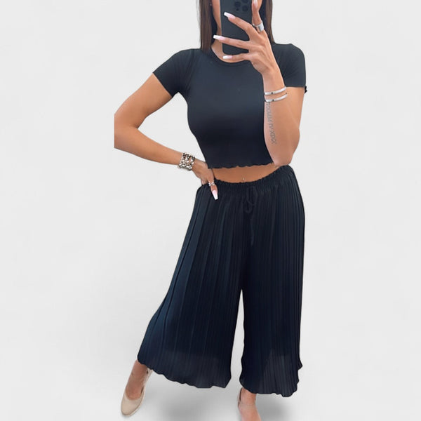 Maja | Crne plisirane pantalone